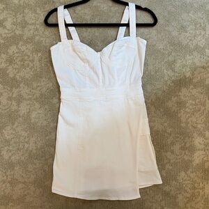 White corset-style mini skort with adjustable straps and zipper back #minidress